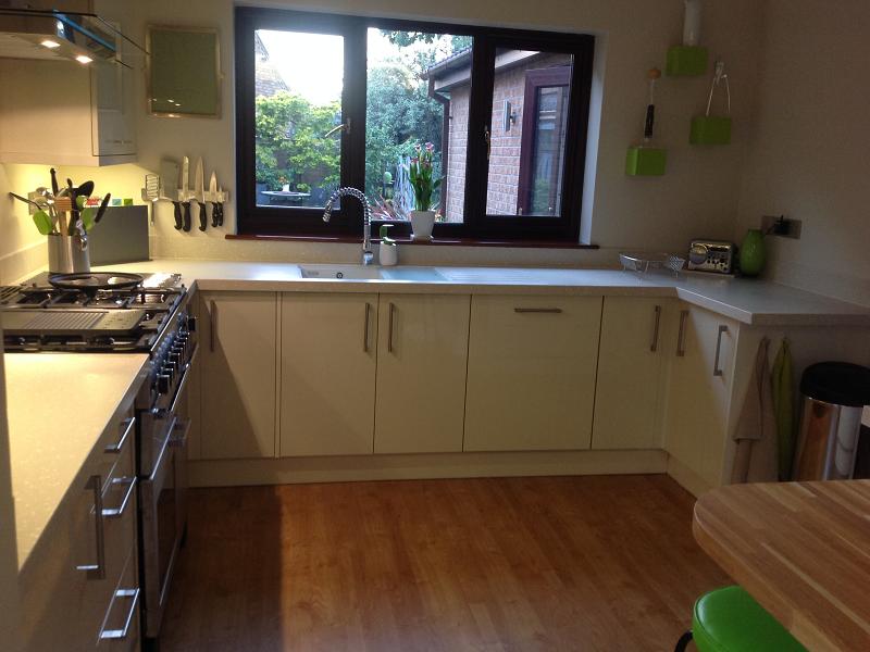 Logica Gloss Ivory kitchen fitted with Encore worktops