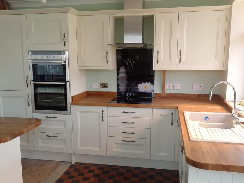 Richmond Iivory painted kitchen fitted with oak worktops