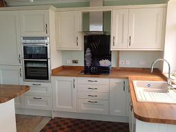 Richmond Ivory painted kitchen fitted with oak worktops